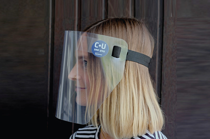 Side view of a model wearing PET Protective Face Shield with Elastic Band in black